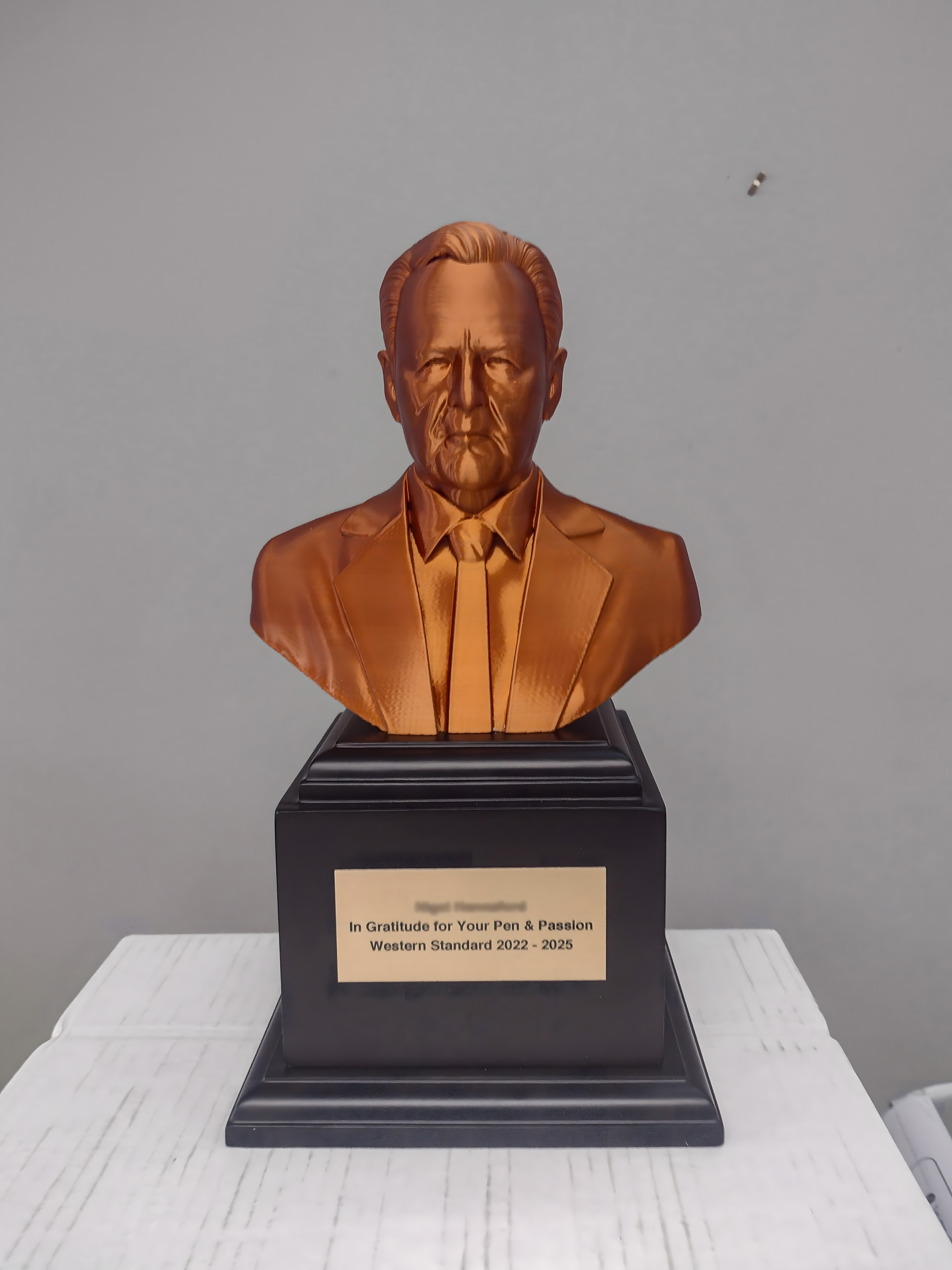 Detailed bronze bust sculpture created with 3D printing